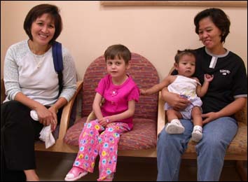 Liza Escoton, life-saved Arife Zejna 7 (Kosovo) and Lyrize Julienne Escoton 1 with her auntie Lani.