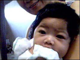 Noelle Sucaldito, 7 months old in May 2002